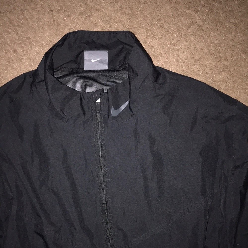 Lightly worn Nike windbreaker/ storm fit
